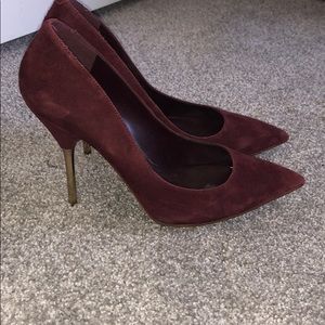 Bebe burgundy suede and gold pumps